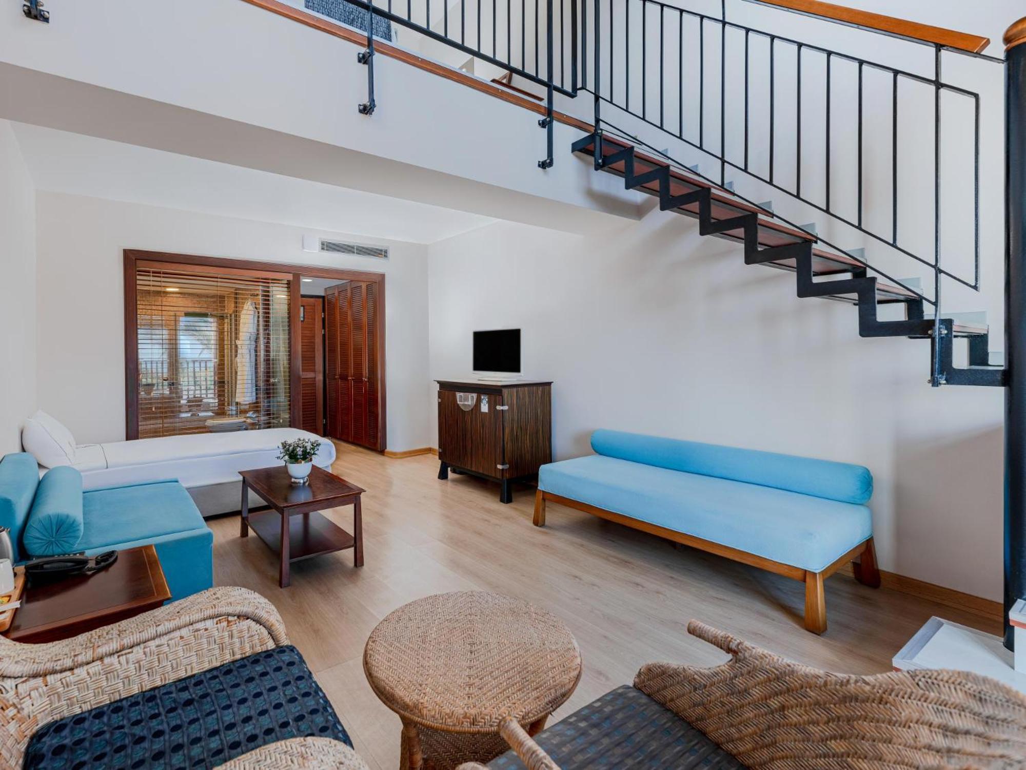 Asteria Family Resort Belek Antalia Esterno foto A living room in a suite at the hotel